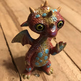 Gregory The Yellow and Orange Dragon with Teal Polka Dots Figurine