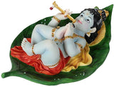 Pacific Giftware Lord Krishna as Baby Laying On Peepal Banyan Leaf Sucking His Right Toe Collectible Figurine (Colored)