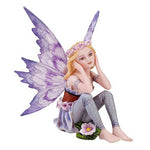 Small Playful Purple Flower Fairy Figurine Made of Polyresin