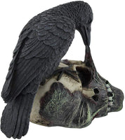 Sinister Raven Devouring Rotten Zombie Skull Figure