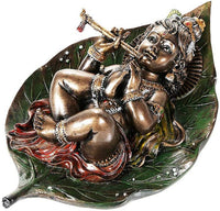Pacific Giftware Lord Krishna as Baby Laying On Peepal Banyan Leaf Sucking His Right Toe Collectible Figurine (Faux Bronze)